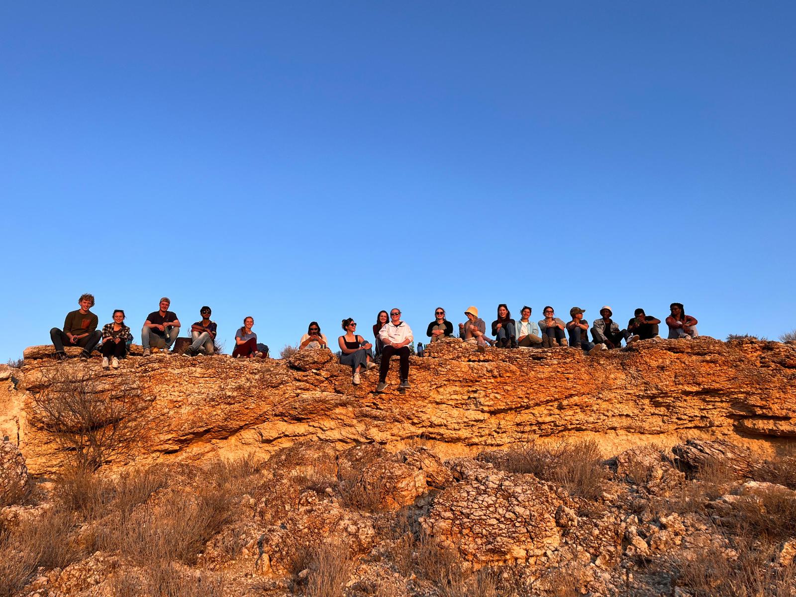 Field team on a rocky outcrop at the South Africa–Botswana border